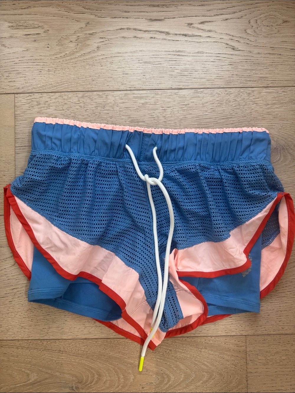 FP Movement by Free People Blue Mesh Athletic Shorts with Pink and Red Trim
